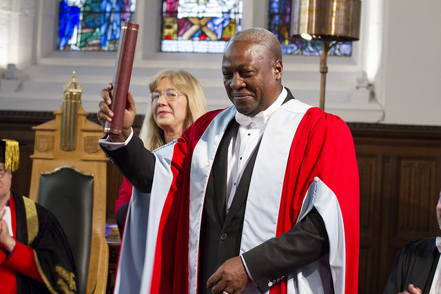 President Mahama shows off her his new certificate