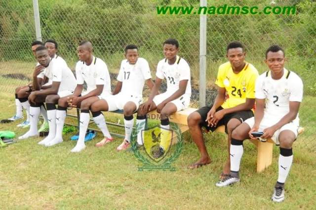 He is in there somewhere: Adebayor and Black Satellites teammates relax at training