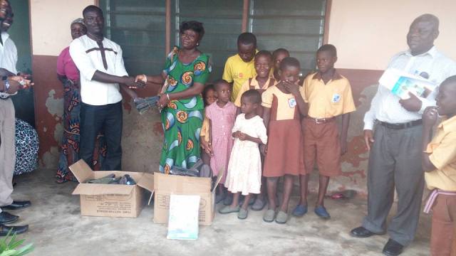 National Youth Authority distribute footwears to Ada school children