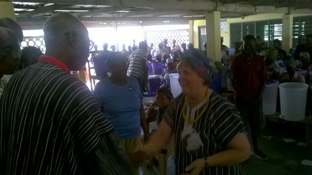 Asafoatse Pediator shaking hands with the donors