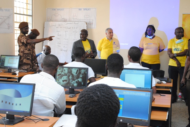 The MTN CEO interacting with inmates of the Nsawam Prison in the computer lab