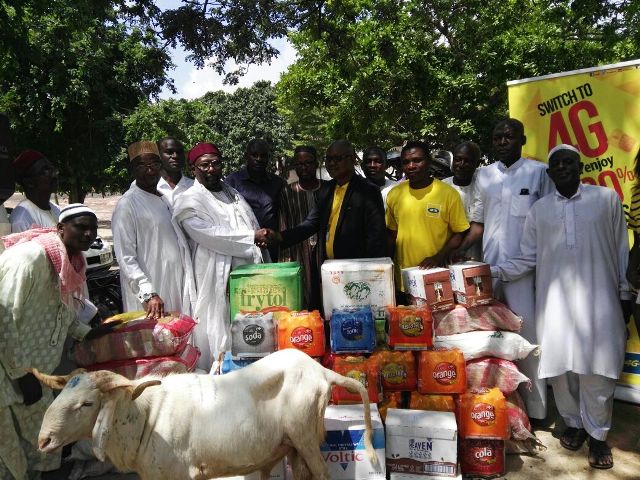 Mr. James Bukari Basintale, GM Regional Sales and Distribution for Northern Business Districts presenting the items to the Regional Chief Imam of Kumasi, Alhaji Abdul-Moomen Harun