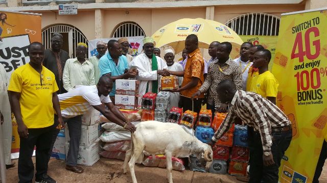 Mr. Tawfiq Momen, Regional Sales Manager for Northern Ghana presenting the items to Regional Chief Imam of Tamale, Sheikh Alhaji Ahmed Abdul-Salaam