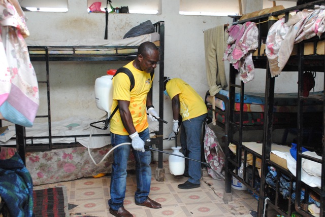 MTN staff volunteers fumigating the cells of the prisons