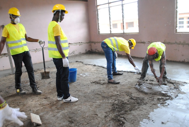 MTN staff volunteers undertaking masonry work at Mampong School for the Deaf