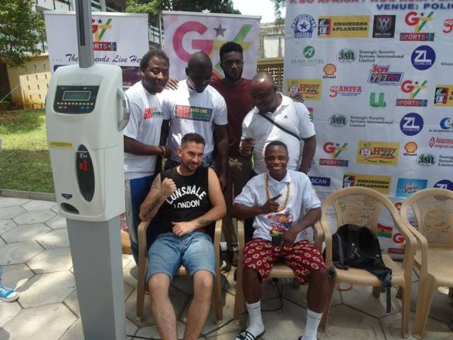 Adam Taylor and Gh Bosslink team pose with Isaac Dogboe