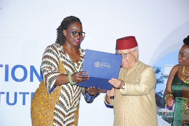 Mrs Cynthia Lumor Corporate Services Executive of MTN Ghana being presented with Certificate of Appreciation by Rotary Foundation representative