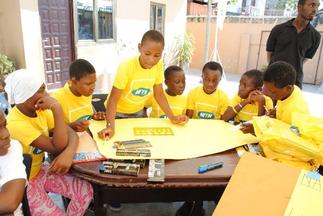 Pupils painting as part of the activities to mark the celebrations