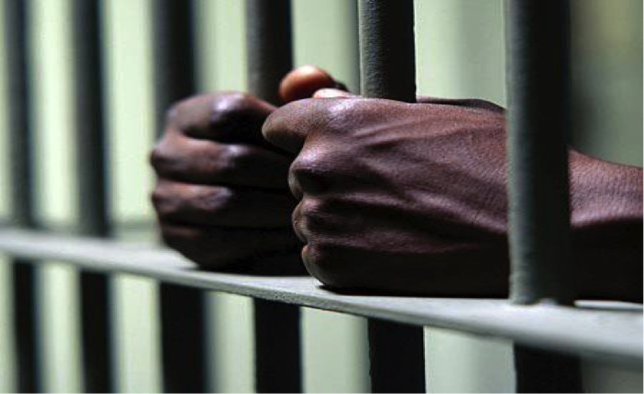 hands-behind-bars