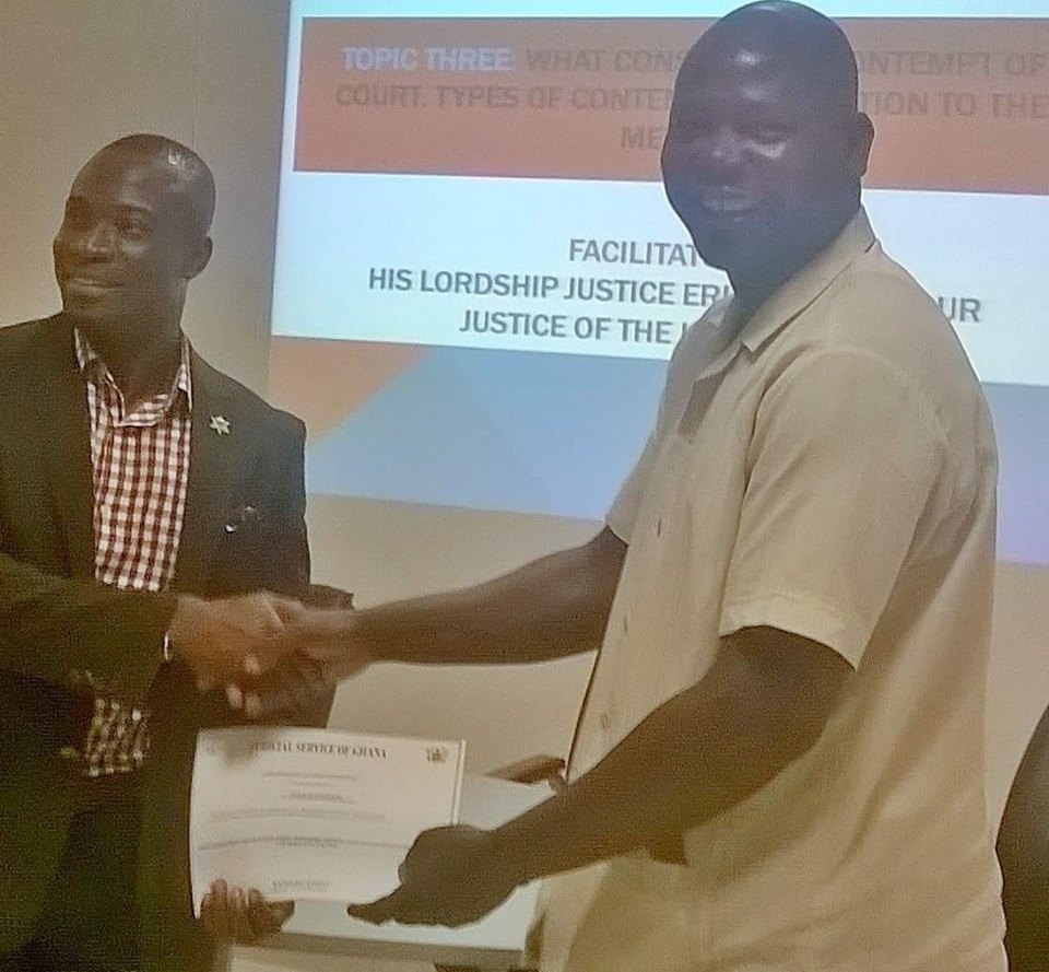 Pride and honour - Noah Dameh receives his certificate of participation