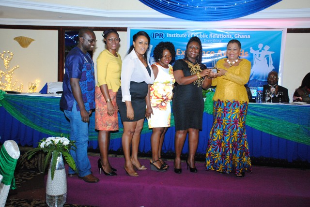 MTN Corporate Comms Team receiving the award from Ms Joyce Aryee