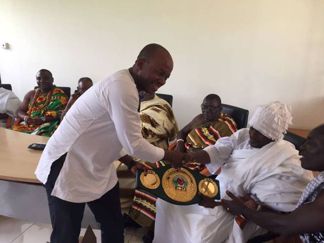 BabyJet promotions CEO, Sammy Anim-Addo presents the IBO belt to the chiefs