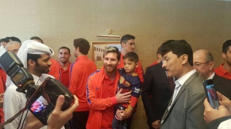 Lionel Messi met with six-year-old Mortaza Hashimi in Doha ahead of Barcelona's international mid-week friendly (Photo: Supreme Committee for Delivery and Legacy)