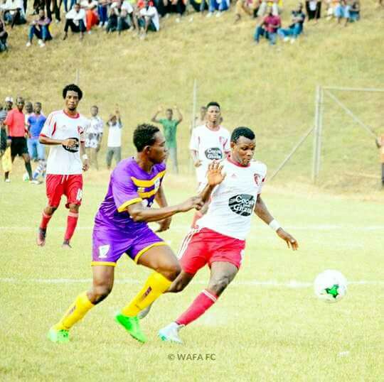 Daniel Lomotey (right) in action for WAFA against Medeama in the Ghana Premier League