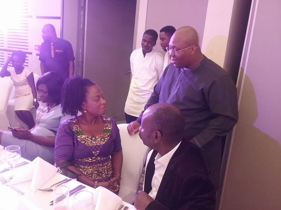 Dr. Dzani (standing) in a chat with MP for Ada, Hon. Doeyo Ghansah and Dr. Narh at the 2017 Asafotufiam launch