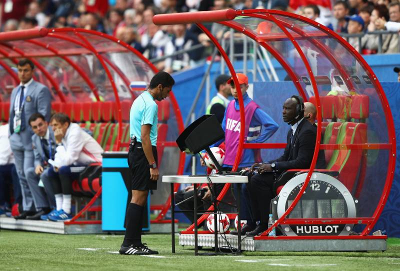 Referee Fahad Al Mirdasi reviewes the VAR footage during the FIFA Confederations Cup Russia 2017 Group A match between Mexico and Russia at Kazan Arena on June 24, 2017 in Kazan, Russia. (Photo by Ian Walton/Getty Images)