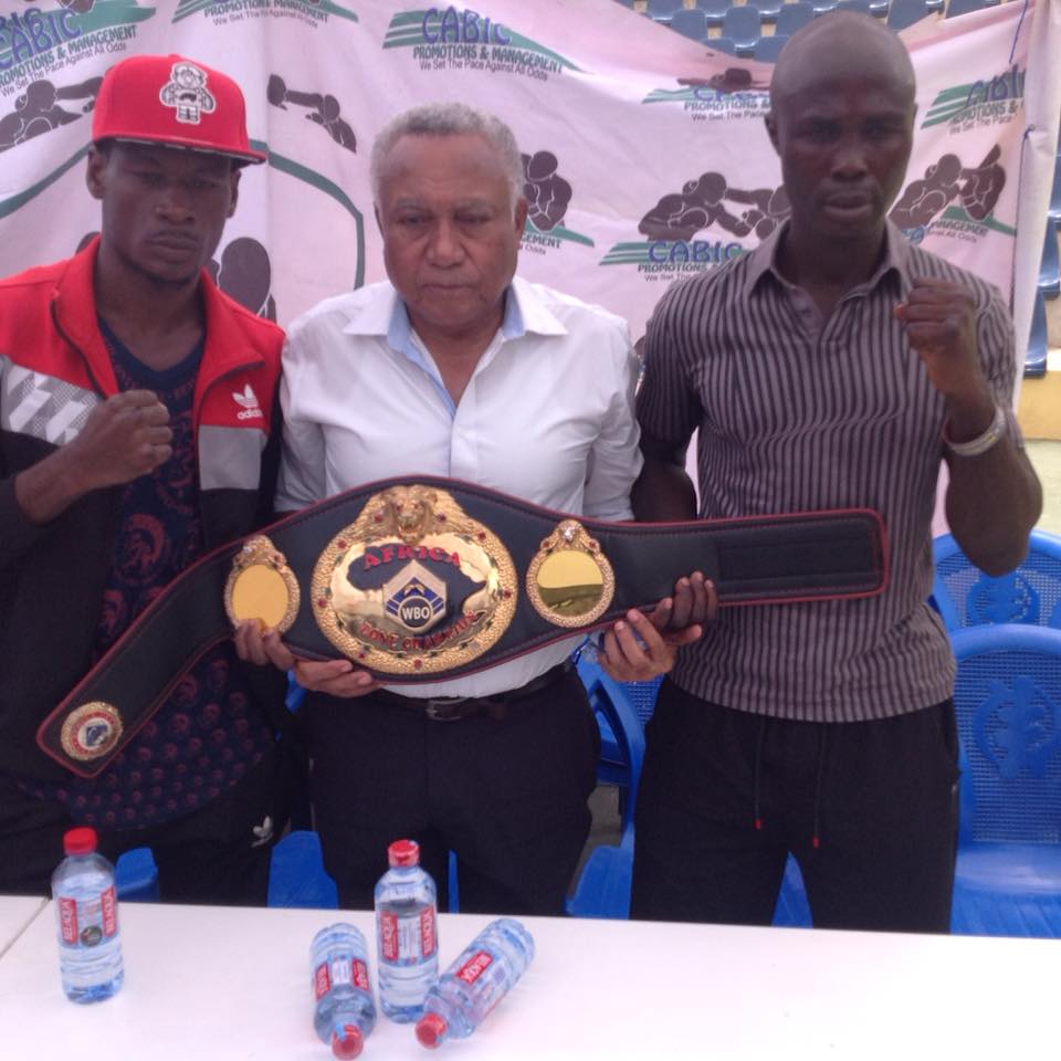 Allotey and Dodzi pose with WBO Africa chief, Samir Captan who holds the title the two will fight for on Saturday