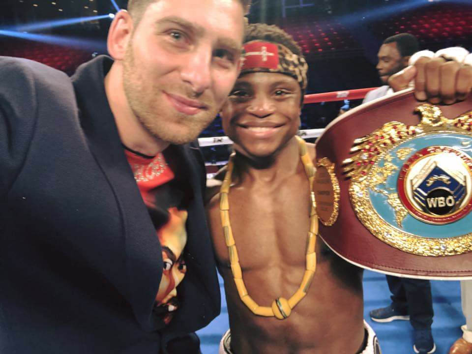 Dogboe celebrates his new title in the ring with his Australia based matchmaker, Mike Altamura