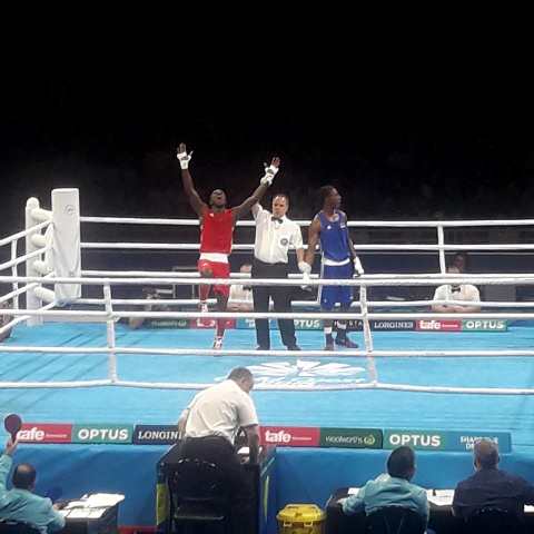 Jessie Lartey is all joy as the referee raises his hands to hand him victory