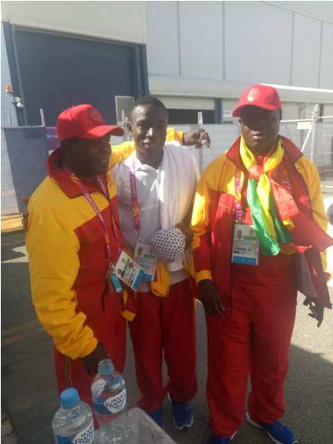 Jessie Lartey with Coach Asare and GBF President, George Lamptey after the fight