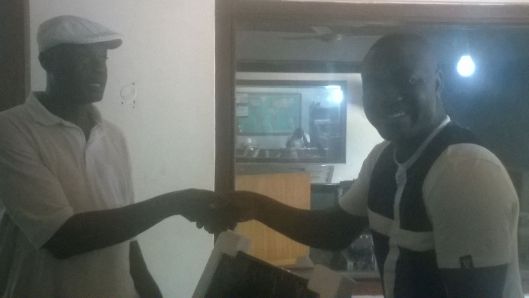 Daniel Onyame shows the way: donates computers to Radio Ada
