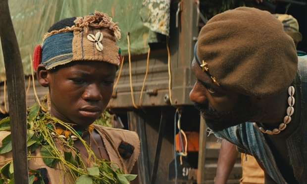 Abraham Attah and Idris Elba in "Beasts of no Nations"